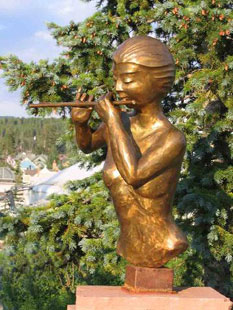 fine bronze flute sculpture by D. Michael Adams