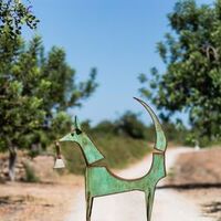 Green dog by Christopher Stone - search and link Sculpture with SculptSite.com