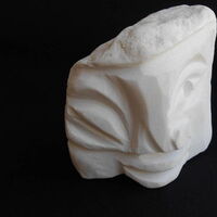 IN THE PALM OF YOUR HAND Winking White by David Willis - search and link Sculpture with SculptSite.com