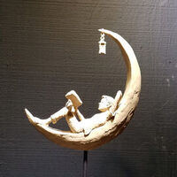 Reading by moonlight by Christopher Yancey - search and link Sculpture with SculptSite.com