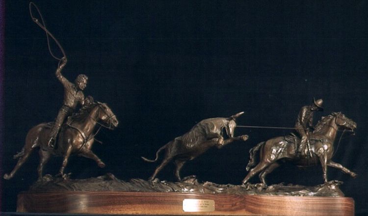 Legends of Rodeo - Leo Camarillo and Tee Woolman, The Lion at Work by Edd Hayes - search and link Sculpture with SculptSite.com