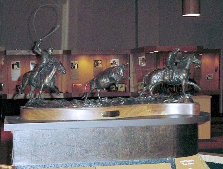 Legends of Rodeo - Leo Camarillo and Tee Woolman, The Lion at Work by Edd Hayes - search and link Sculpture with SculptSite.com