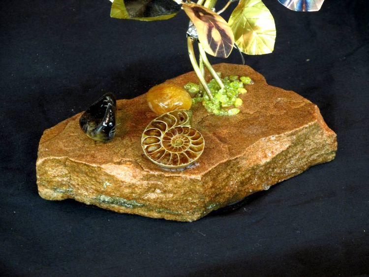 A Triple Butterscotch Onyx Stone Flower Sculpture by John Foster - search and link Sculpture with SculptSite.com